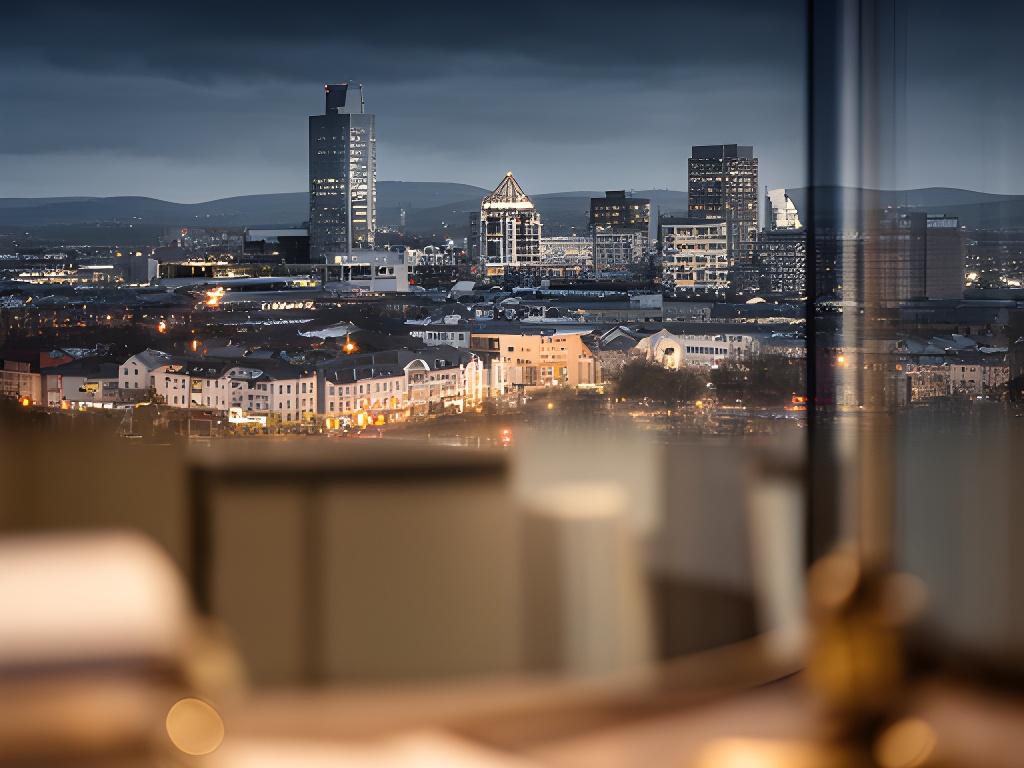 Tallaght town centre skyline at dusk with a warm office-style legal setting in the foreground